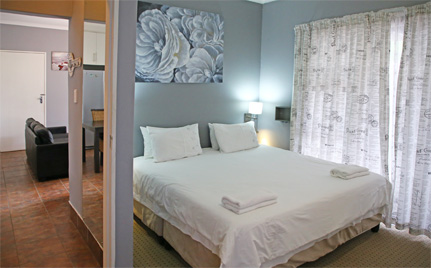 Luxury Self-Catering Unit Middelburg EC - our Premier King Suite is top end luxury with home-like conveniences like direct access to pool and private braai area.